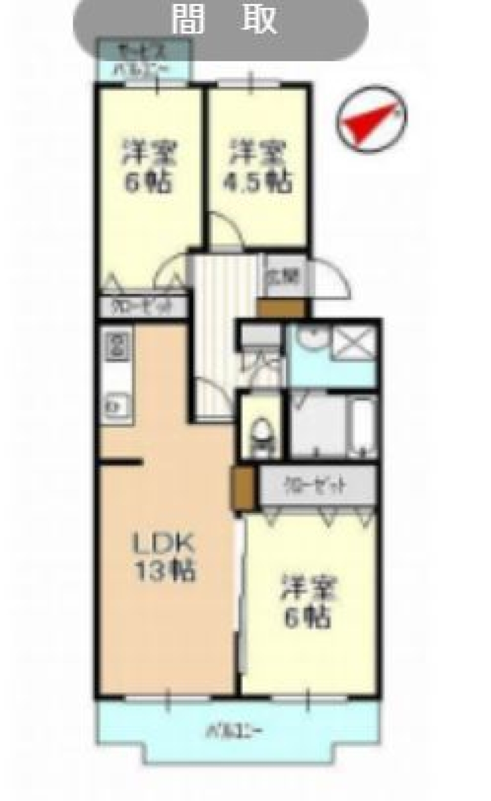 赤のキッチンが映えるお部屋の間取り図