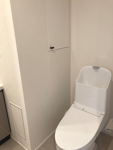 トイレは洗面所と一体になっています。※写真は同タイプ住戸です。