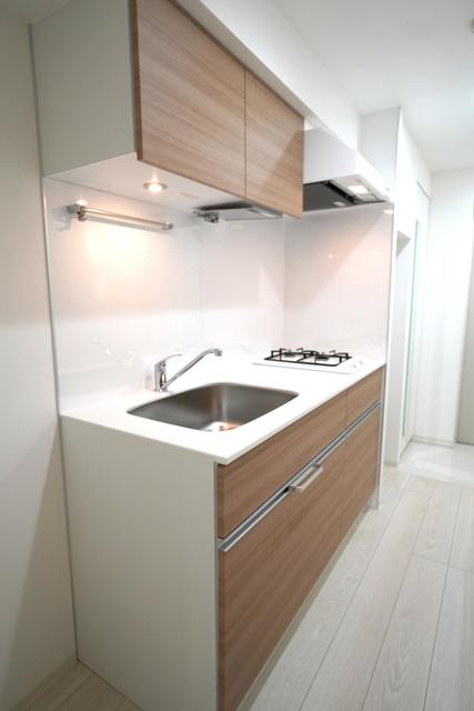 キッチンには木の温もりをプラス！
※写真は同タイプ住戸です。