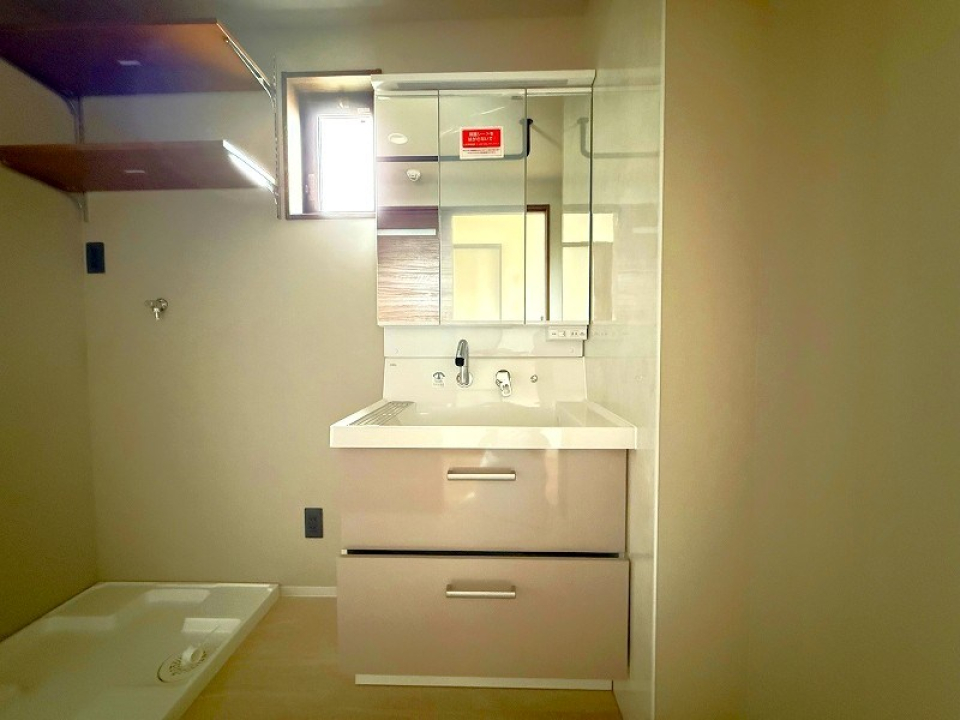 洗濯機はお隣りへ